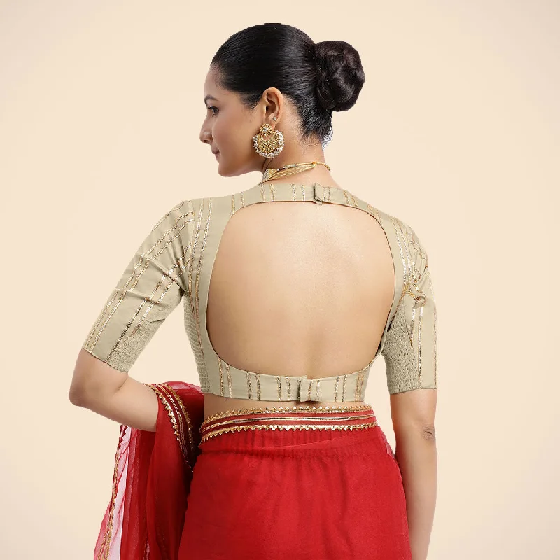 Shaheen x Tyohaar | Cream Elbow Sleeves FlexiFit™ Saree Blouse with Zero Neck with Back Cut-Out and Golden Gota Embellishment