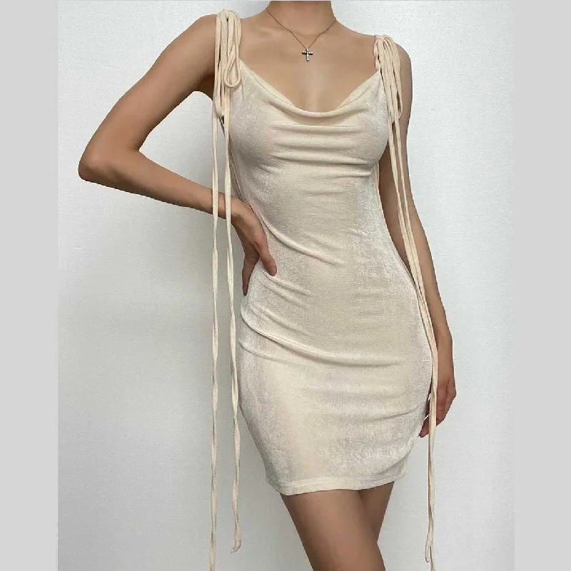 "Graduation dresses for women to celebrate in style"BerryBetty - Cowl neck self tie backless ribbon solid mini dress "Graduation dresses for women to celebrate in style"BerryBetty - Cowl neck self tie backless ribbon solid mini dress