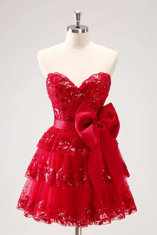 "Satin dresses for women for a luxurious appearance"Sparkly Red A-Line Strapless Tiered Sequins Homecoming Dress with Bow