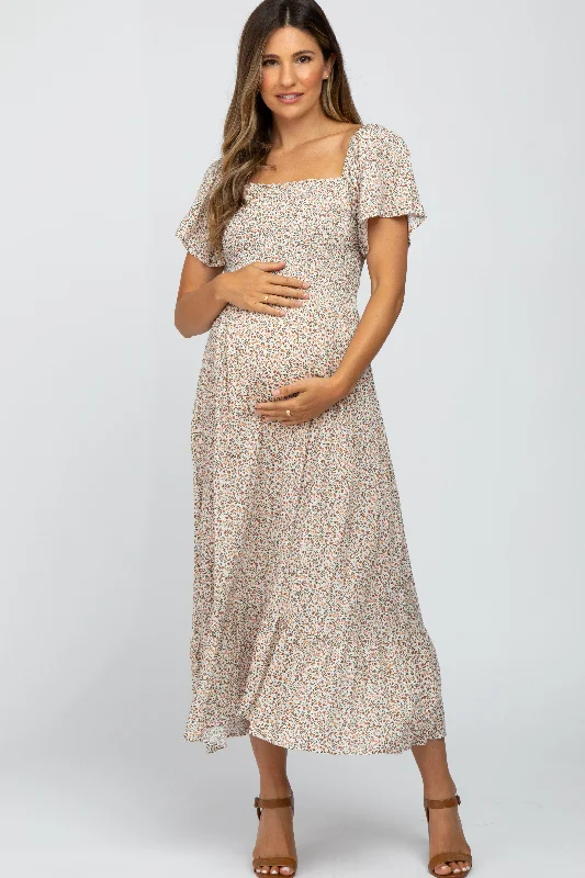 "Simple wedding dresses for women who prefer understated elegance"Ivory Floral Smocked Maternity Maxi Dress "Simple wedding dresses for women who prefer understated elegance"Ivory Floral Smocked Maternity Maxi Dress