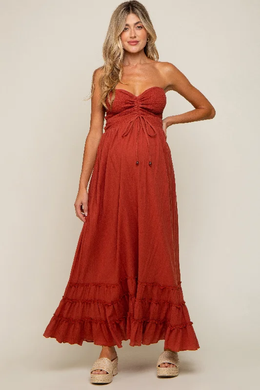 "Red dresses for women to make a bold statement"Rust Smocked Cutout Back Maternity Maxi Dress "Red dresses for women to make a bold statement"Rust Smocked Cutout Back Maternity Maxi Dress