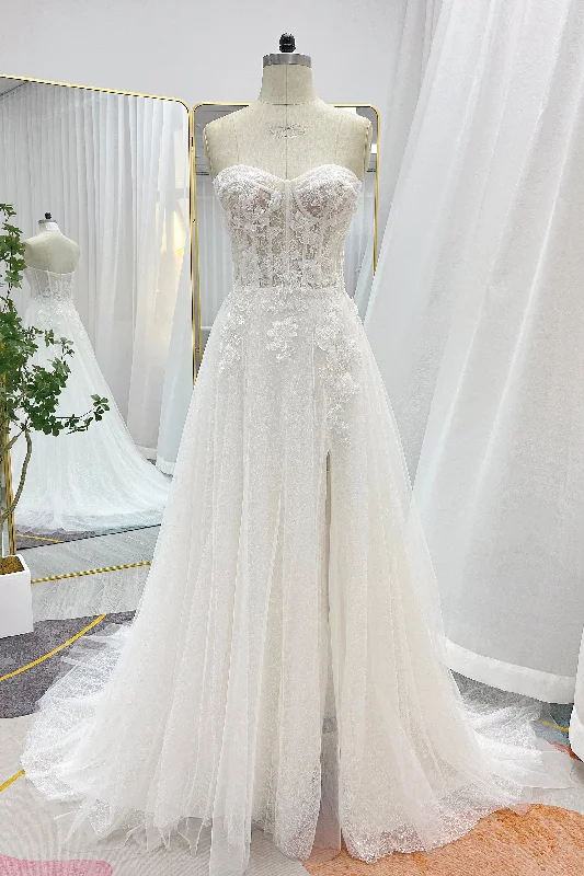 Wedding Dresses with Tassel Hem and Metallic Lace and Sequined Geometric Shapes and Satin Ribbon for a Boho and Luxurious LookA-Line Court Train Lace Tulle Wedding Dress CW3239 Wedding Dresses with Tassel Hem and Metallic Lace and Sequined Geometric Shapes and Satin Ribbon for a Boho and Luxurious LookA-Line Court Train Lace Tulle Wedding Dress CW3239
