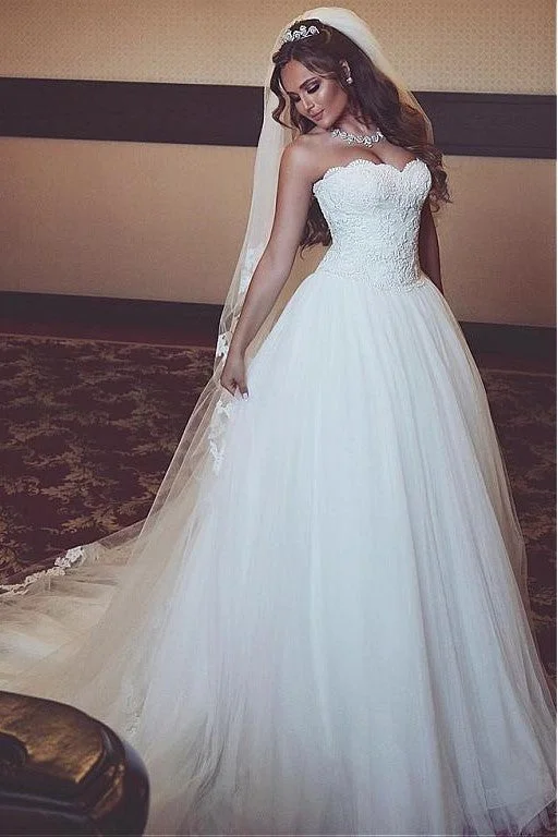 Pearl - studded wedding dress for a refined lookA-line Strapless Lace Corset Wedding Dresses Ivory Tulle Skirt Pearl - studded wedding dress for a refined lookA-line Strapless Lace Corset Wedding Dresses Ivory Tulle Skirt