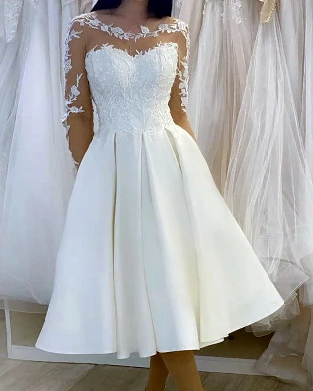 Jeweled - bodice wedding dress for a sparkly lookVintage Tea Length Wedding Dresses Sheer Long Sleeves Jeweled - bodice wedding dress for a sparkly lookVintage Tea Length Wedding Dresses Sheer Long Sleeves