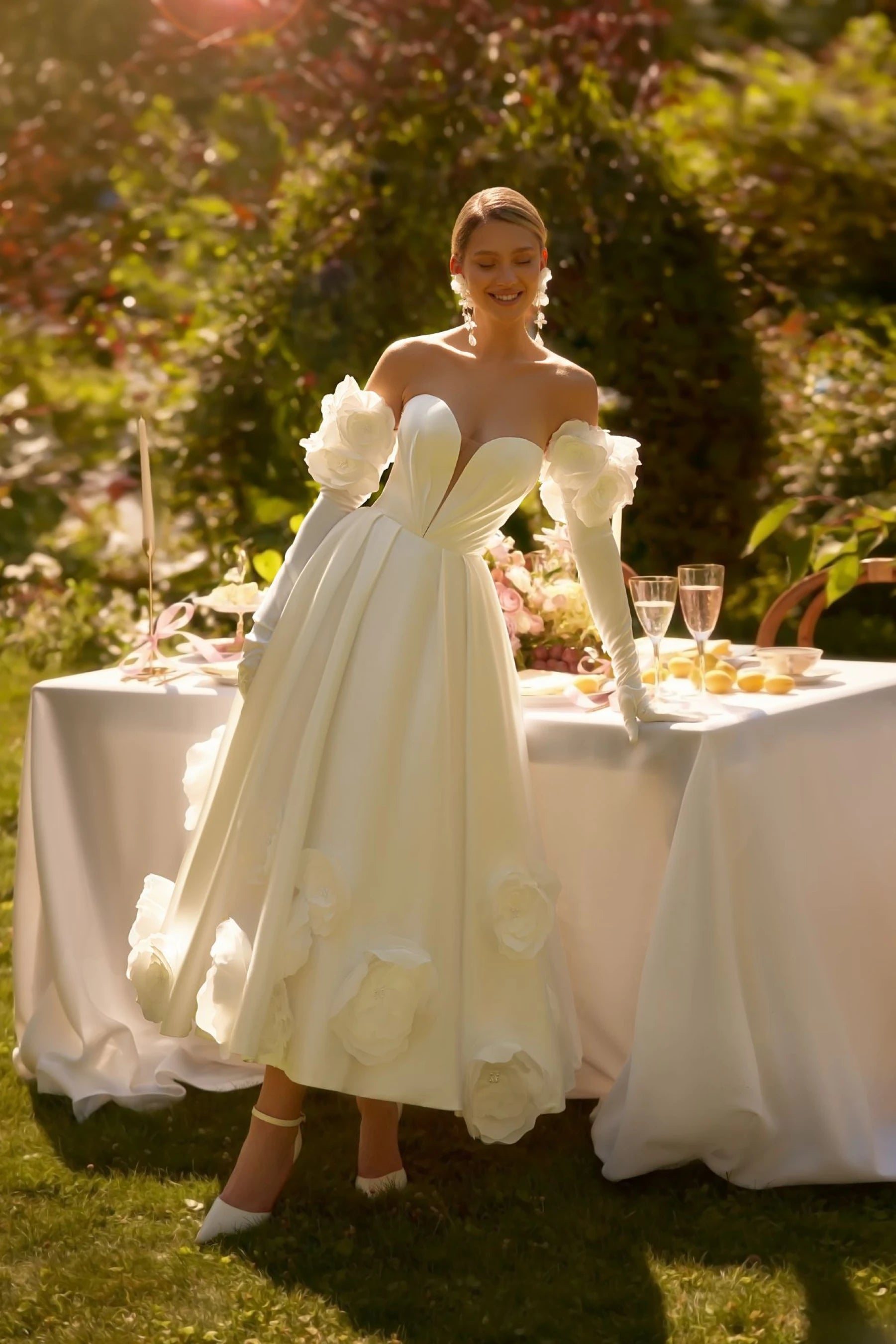 Pearl - studded wedding dress for a refined lookBlossom