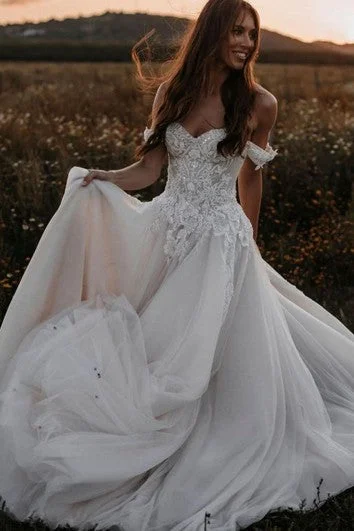 Metallic - thread - detailed wedding dressBohemian A Line Tulle Off-the-shoulder Wedding Dress with Appliques Metallic - thread - detailed wedding dressBohemian A Line Tulle Off-the-shoulder Wedding Dress with Appliques