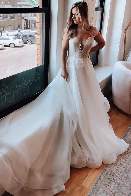 Peplum - style wedding dress for a flattering silhouettePrincess Long A-line Cap Sleeves White Wedding Dress with Lace Peplum - style wedding dress for a flattering silhouettePrincess Long A-line Cap Sleeves White Wedding Dress with Lace