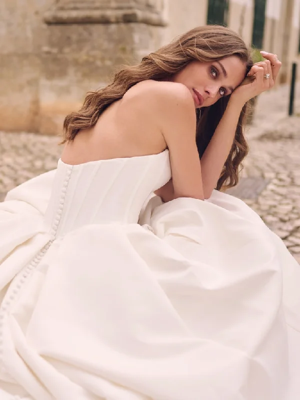 New - age - style wedding dress with unique detailsDerrick