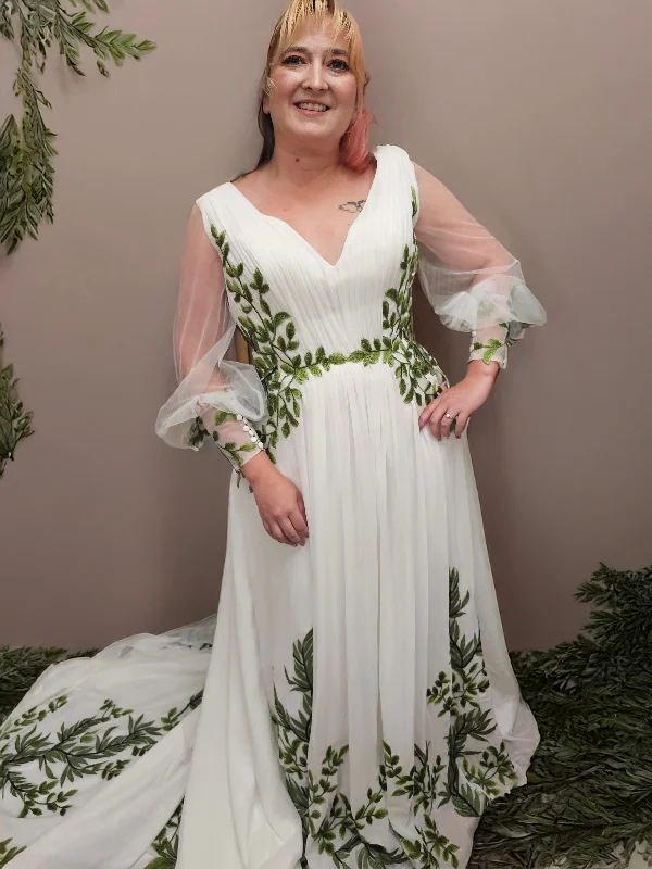 Diamond - encrusted wedding dress for a luxurious feelEden