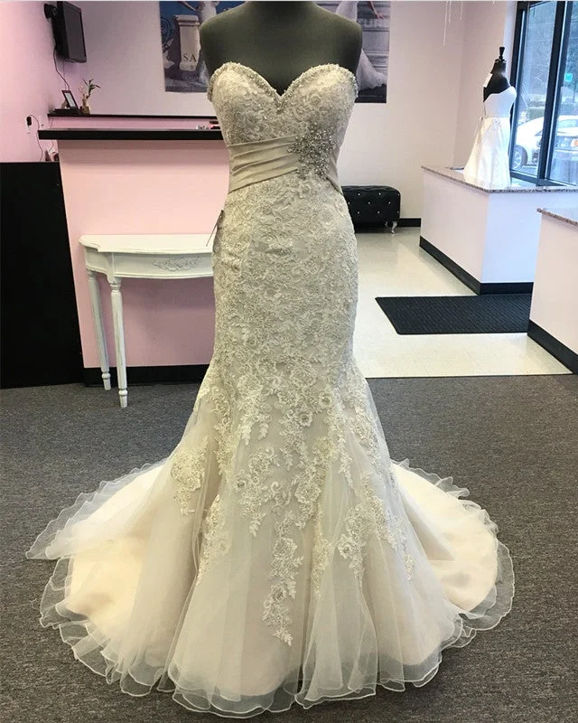 Wedding Dresses with Ruffled Sleeveless Top and Sequined Bodice and Tulle Skirt and Beaded Waistband and Bow at the Back for a Dramatic and Glamorous LookLuxurious Beaded Sweetheart Mermaid Court Train Wedding Dresses Lace Embroidery Wedding Dresses with Ruffled Sleeveless Top and Sequined Bodice and Tulle Skirt and Beaded Waistband and Bow at the Back for a Dramatic and Glamorous LookLuxurious Beaded Sweetheart Mermaid Court Train Wedding Dresses Lace Embroidery