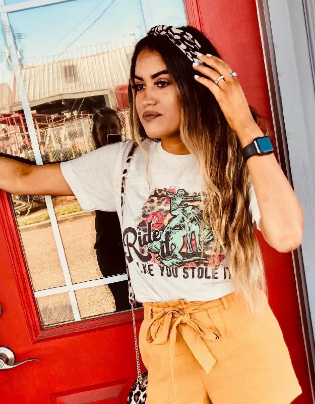 Printed women's T - shirt with a retro - inspired patternRide It Like You Stole It Tee