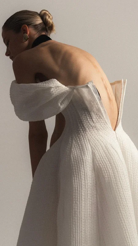 Gothic - inspired wedding dress for an edgy brideSense