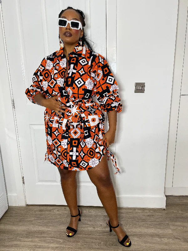 Dresses with Tassel Hem and Metallic Lace for Ladies' Boho and Luxurious LookIsabel Ankara Shirt Dress | Orange and White African Print Dresses with Tassel Hem and Metallic Lace for Ladies' Boho and Luxurious LookIsabel Ankara Shirt Dress | Orange and White African Print